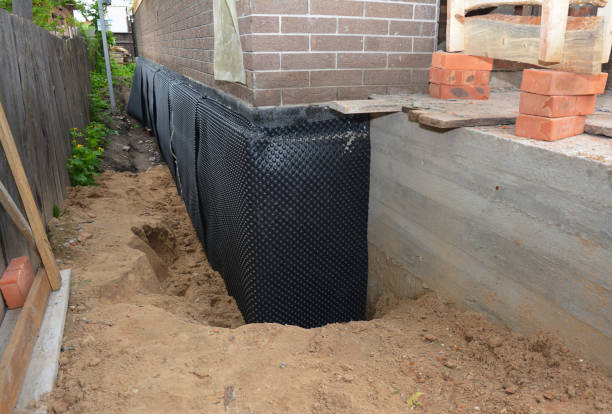 SJ Waterproofing Pros technician performing targeted Interior Drainage System assessment in Grosse Pointe, MI